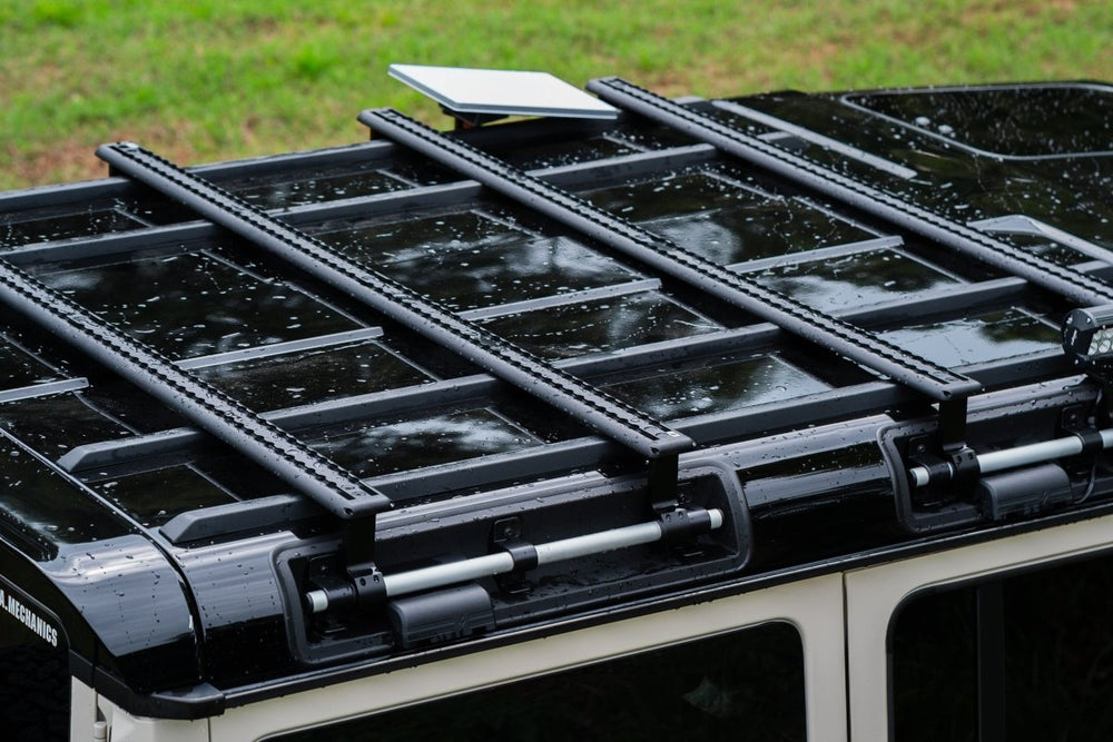 Load Bars vs Gutter Clamps on the INEOS Grenadier: The No-Drill Decision Guide