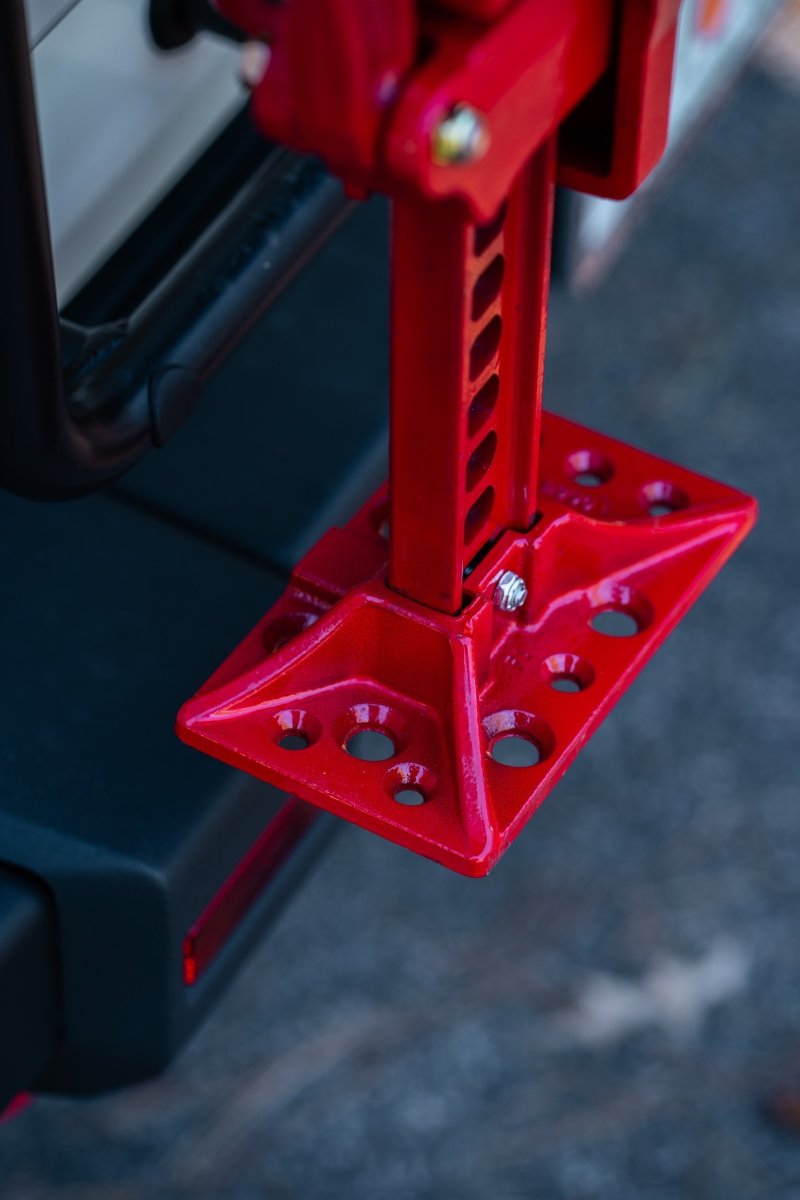Rear ladder-mounted Hi-Lift jack carrier for INEOS Grenadier by DVA Mechanics – rugged off-road accessory